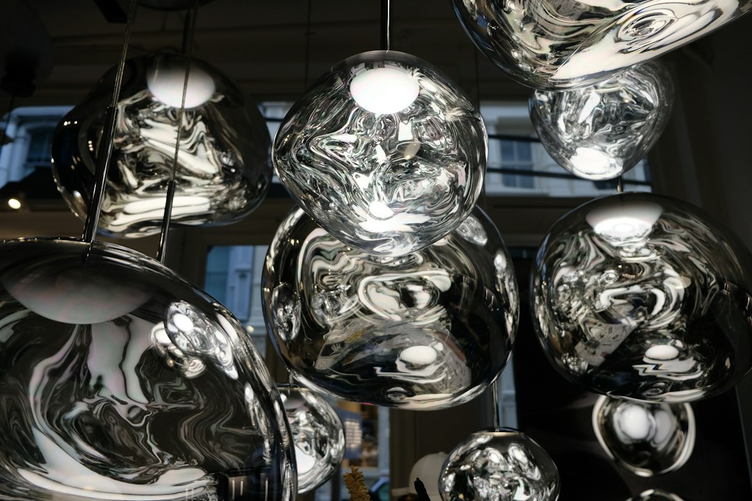 Photo polished chrome organic modern chandelier